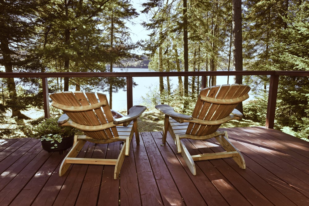 Adirondack Chairs In Forest